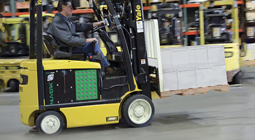 Yale Electric Forklift Transporting Pallet
